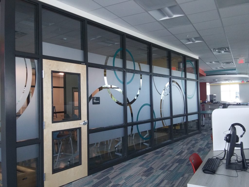 An office space transformed with our custom window frosting materials and installation (Tampa Bay)